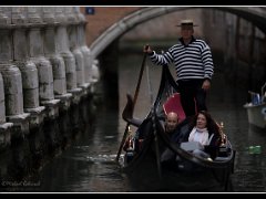 gondola under bridge : venice